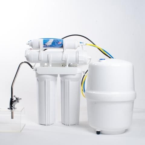 A water filter system with the lid open.